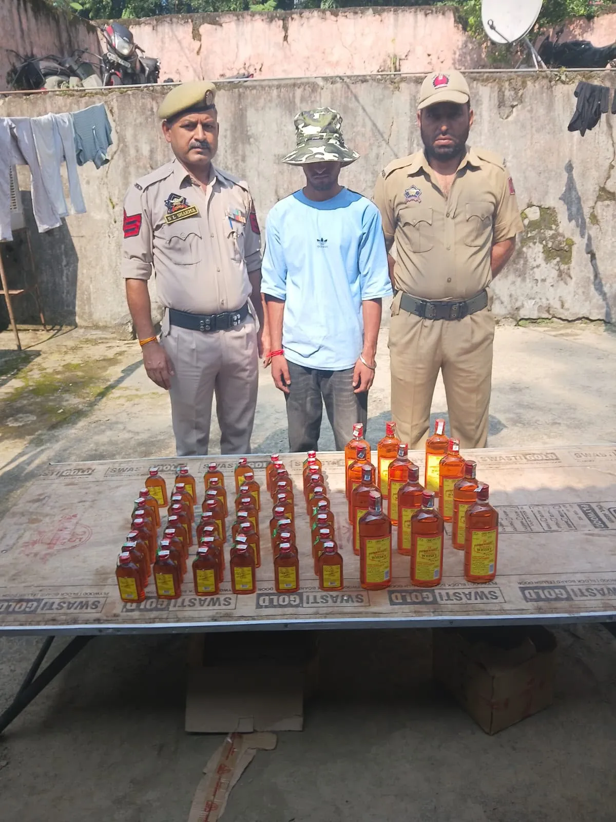62 BOTTLES OF JK SPECIAL DESI WHISKY SEIZED AT HUTT MASHKA BASOHLI AREA; 01 BOOTLEGGER ARRESTED; 01 ECO VAN SEIZED.
