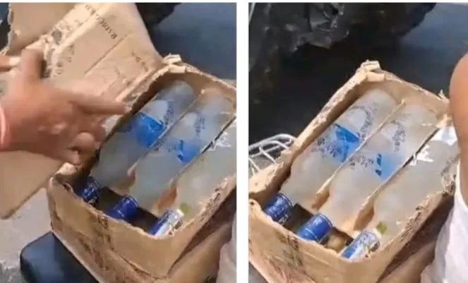 बिहार में शराब की मची है लूट, ट्रक पलटा तो बोतल और कार्टून लेकर भागते दिखे लोग...